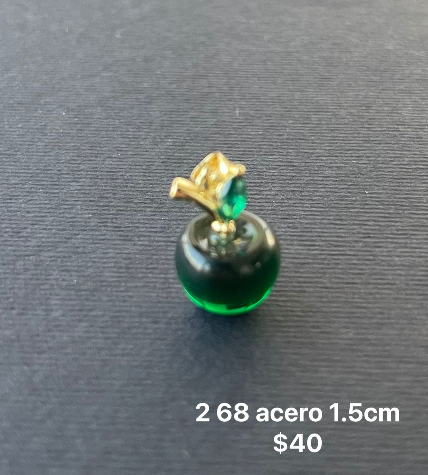 Dije acero y cristal