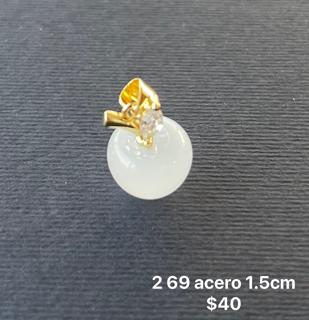 Dije acero y cristal